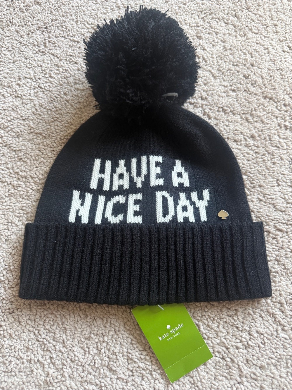 Brand new Kate Spade Black & White "Have A Nice Day" Pom Beanie